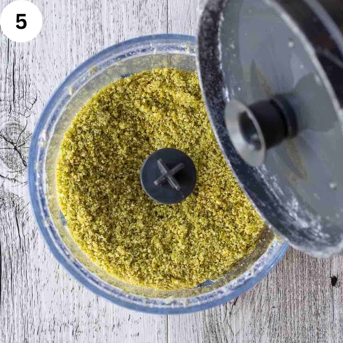 Pistachio nuts ground in a small food processor.