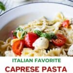 Caprese Pasta Salad in a bowl with another bowl in the background.