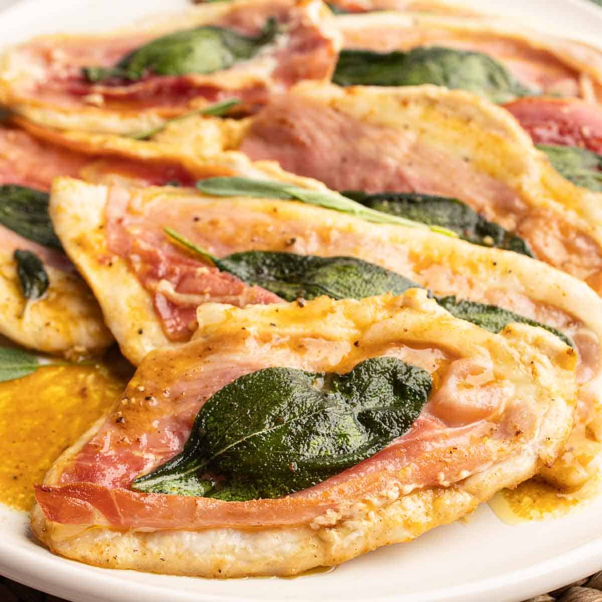 Chicken Saltimbocca arranged on a serving platter.