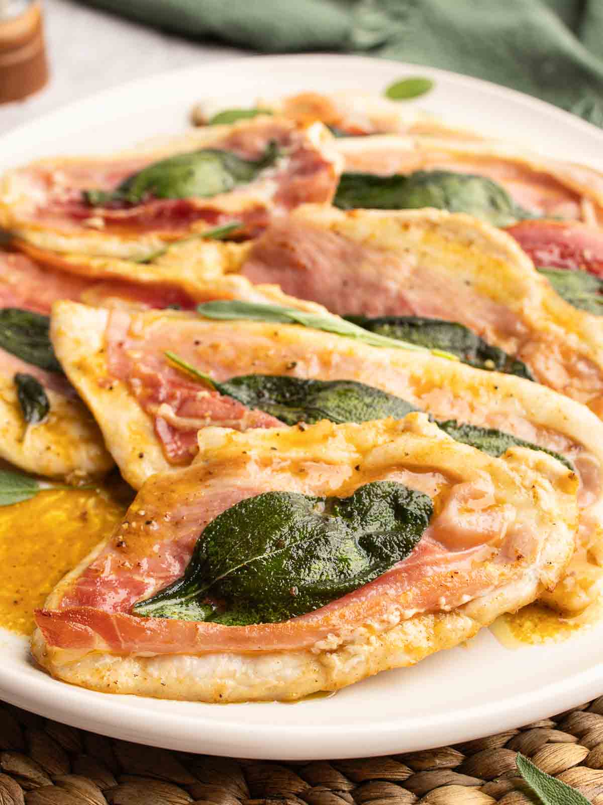 Chicken Saltimbocca arranged on a serving platter.